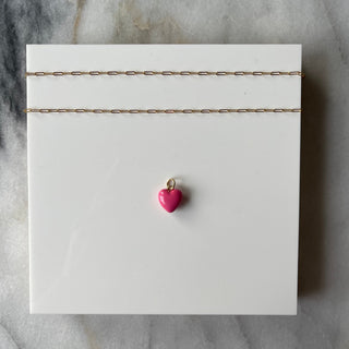 dark pink puff heart on white background